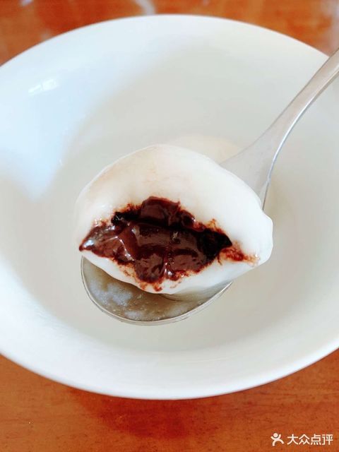 钙奶什锦汤圆推荐菜:火神妙老城里钙奶汤圆(西湖道总店)位于天津市