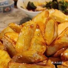 铁锅炖推荐菜:山河屯铁锅炖饭店位于辽源市东丰县河堤路700号