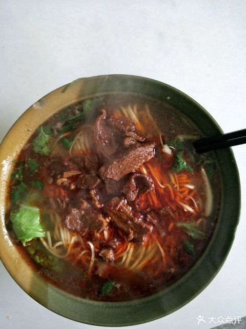 王中王粉馆位于怀化市溆浦县312省道韩城攻略旁推荐菜:牛肉粉木耳肉丝