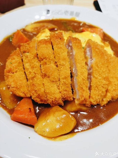 手工炸牛排咖喱蛋包饭图片