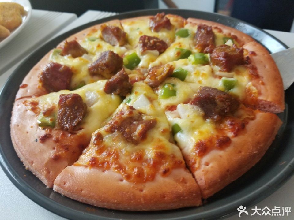 榴莲披萨推荐菜:奥里奥罗现烤比萨(万虹广场店)位于济南市历城区工业