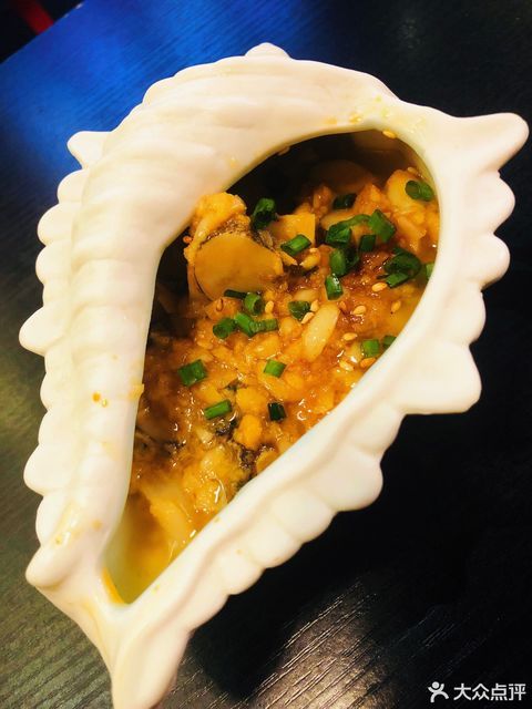 招牌蒜蓉烤海螺图片