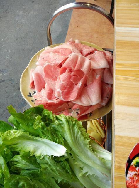 手工刨羊肉图片