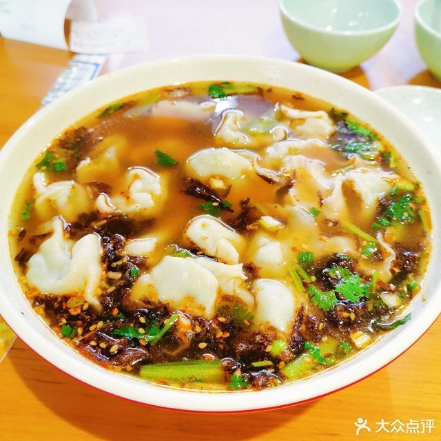 激情酸汤特色汤饺图片