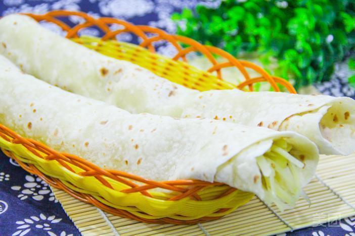 猪头肉卷饼土豆丝卷饼推荐菜:潍坊朝天锅(泉州路店)位于青岛市胶州市