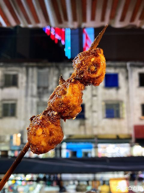 百色特色碳烤爆浆猪眼图片