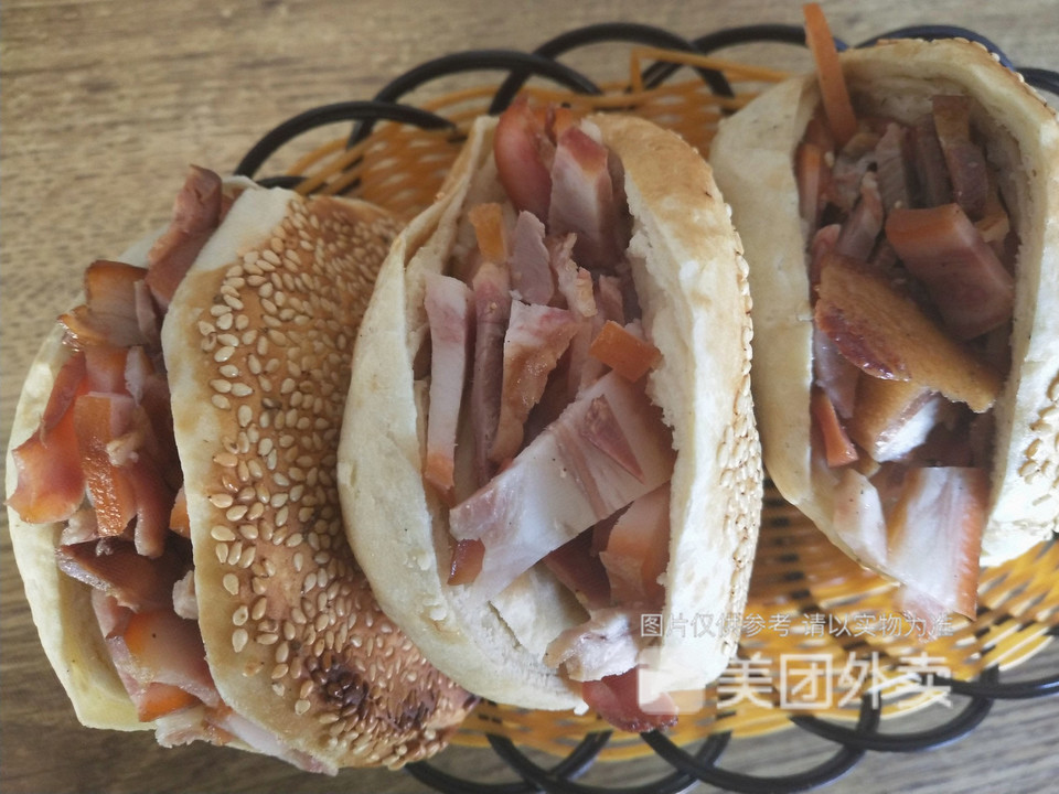 烧饼夹猪头肉图片