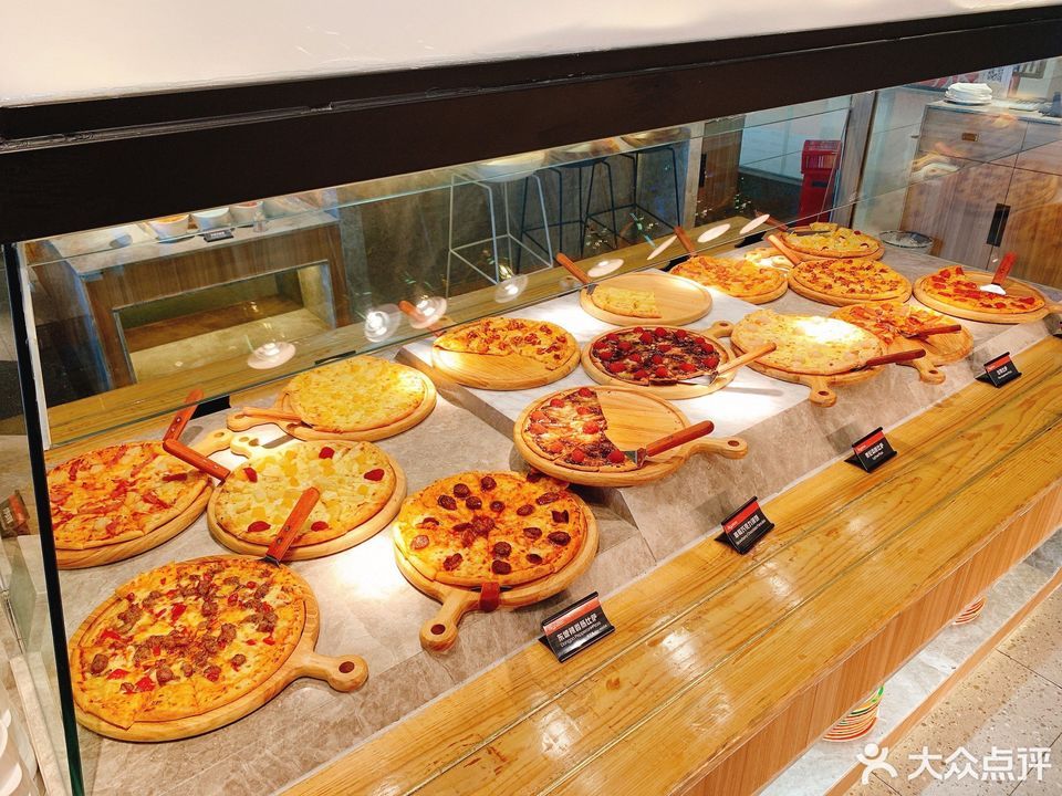 榴莲披萨推荐菜:比格比萨自助(逗号立方店)位于邢台市信都区中兴西