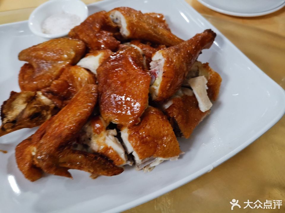 白切安鋪雞飯燒雞飯推薦菜:黎記大飯店位於湛江市廉江市新興南路與