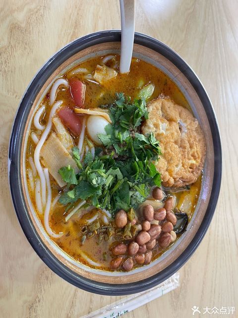 傣味酸辣米线图片