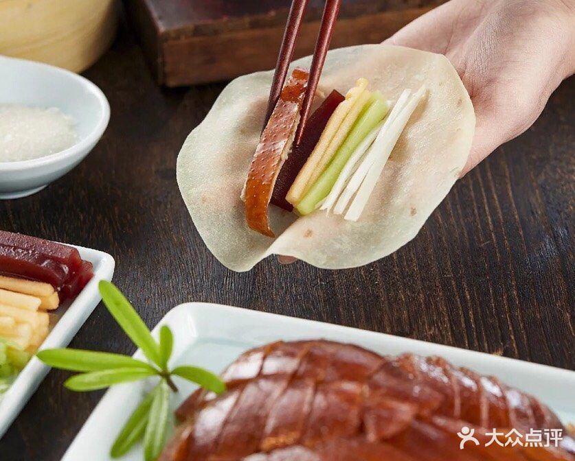 北京片皮鸭石板烤鸭推荐菜:庆德丰烤鸭位于上海市嘉定区德华路556号
