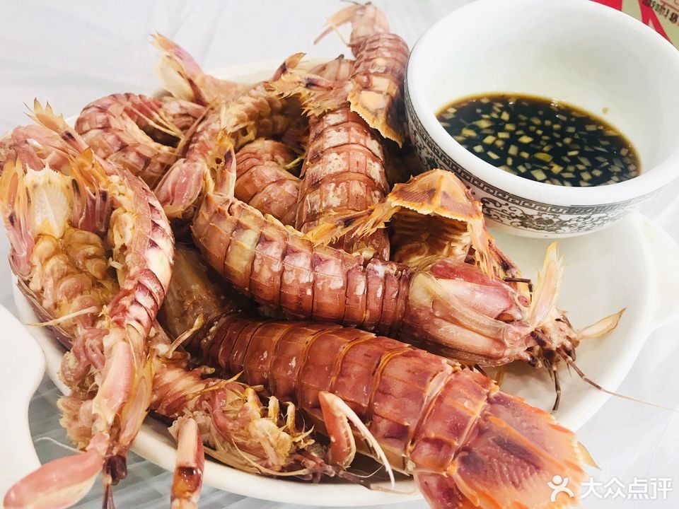 推荐菜:北塘河洛海鲜饭庄(抗震路店)位于天津市滨海新区抗震路辽宁里