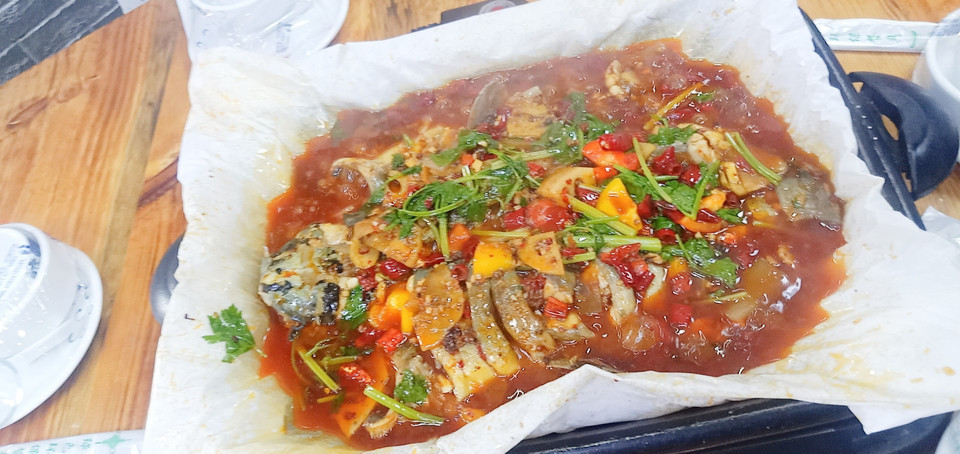 蒜香纸包江团图片