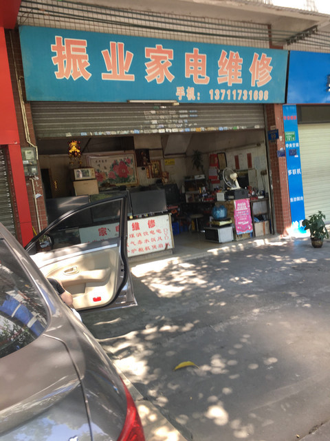 啄木鸟家电维修电话