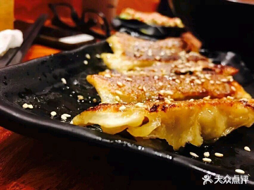 日式铁板煎饺图片