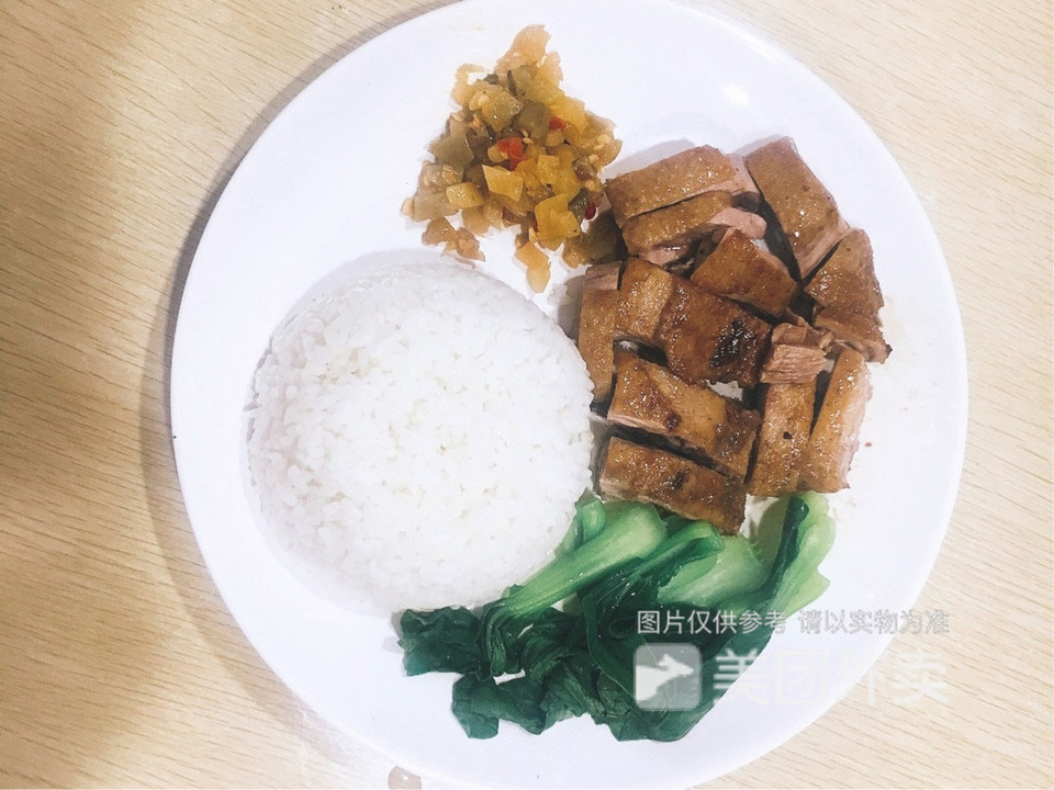 明记隆江猪脚饭(狮子坪店)位于重庆市渝北区山茶路47号