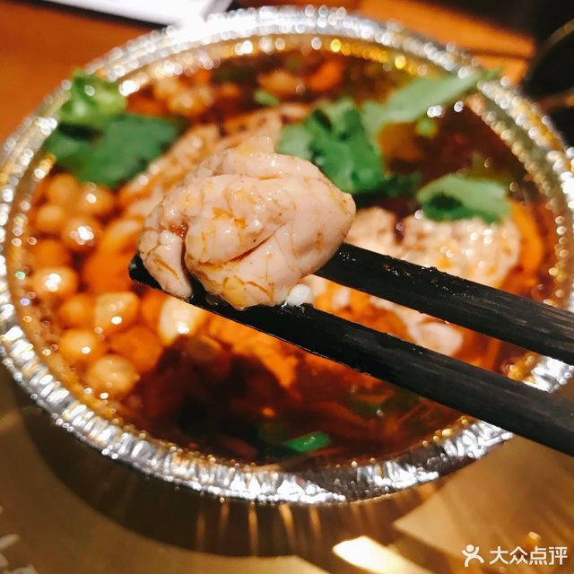 九村烤猪脑图片